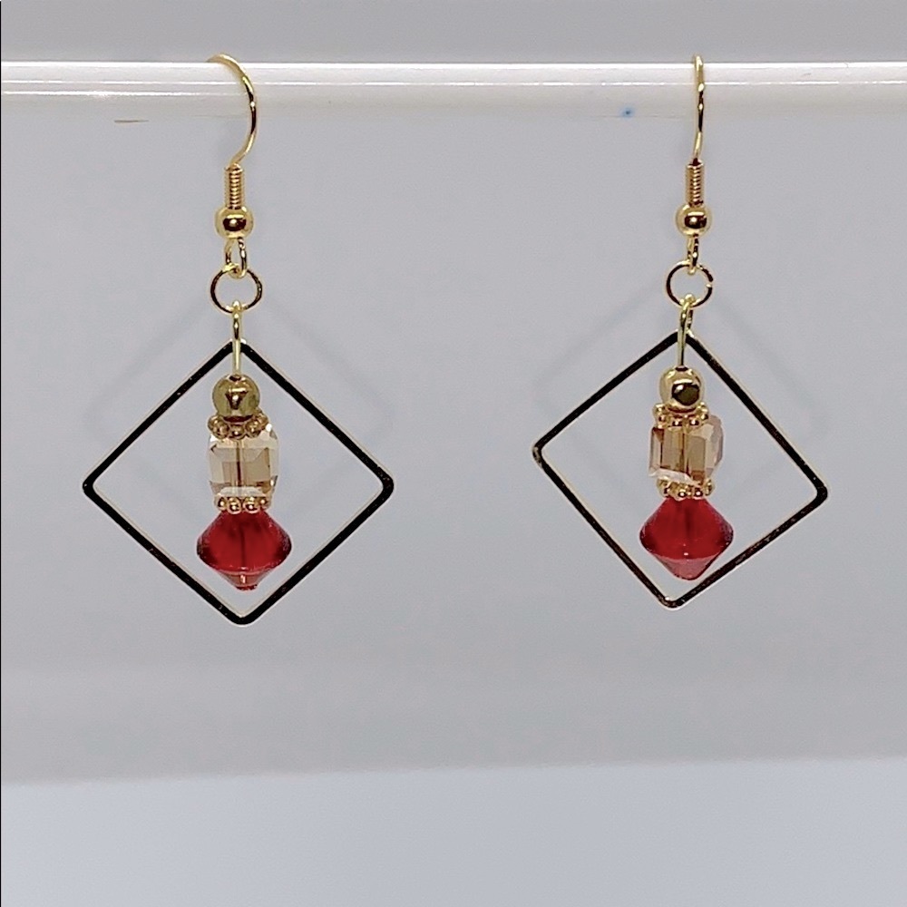 21062 Amber glass and red rhinestone earrings